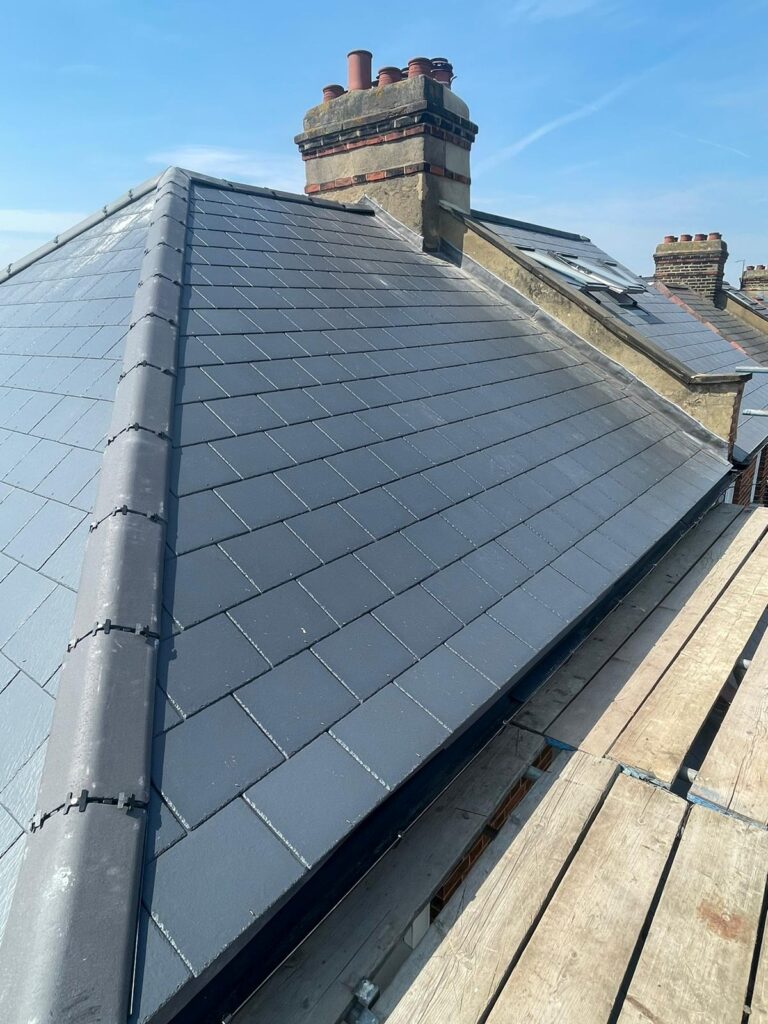 Roof replacement using CEDRAL Rivendale slates complete with UPVC fascia and guttering replacement